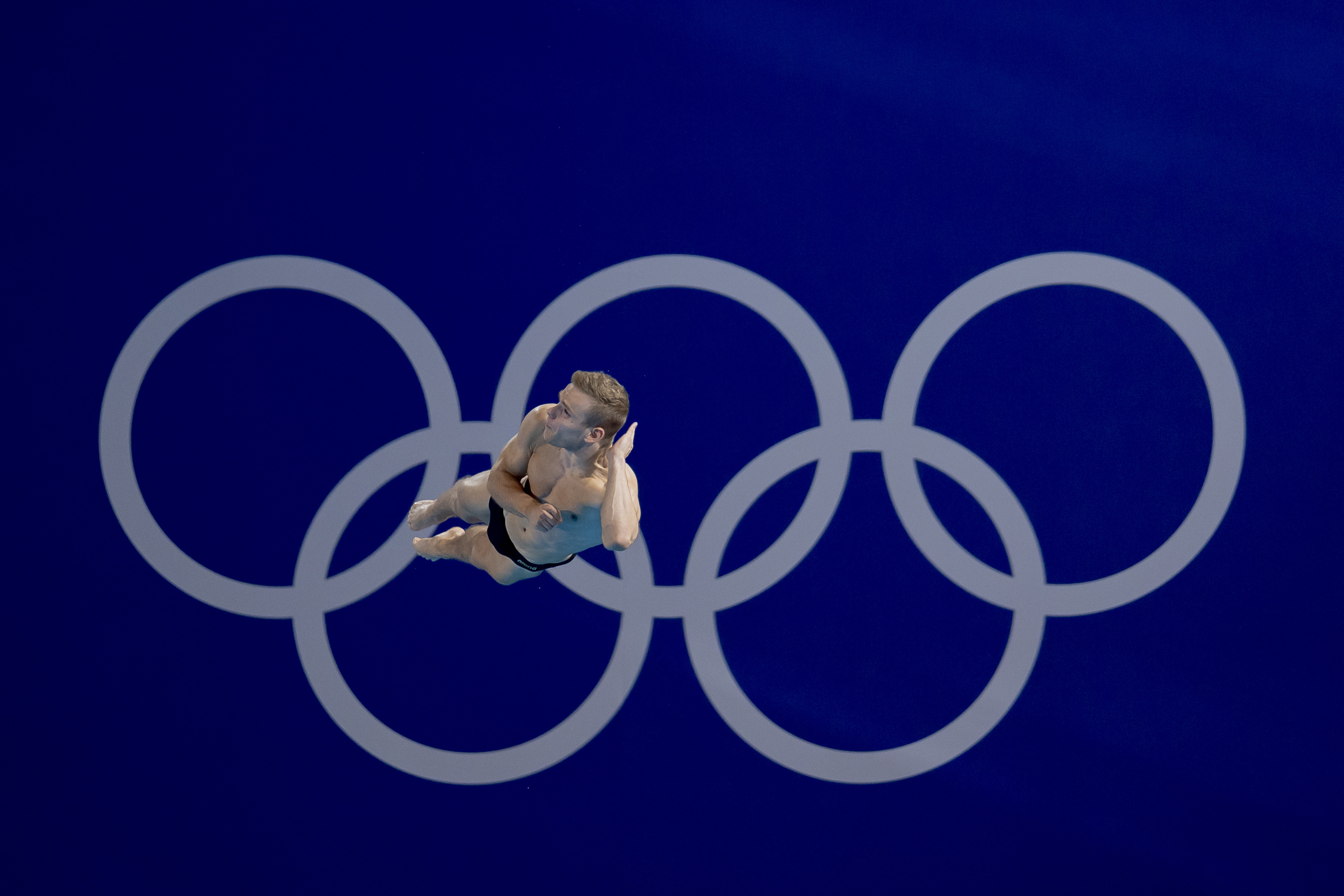Moritz Wesemann competing beneath the Olympic Rings at Paris 2024