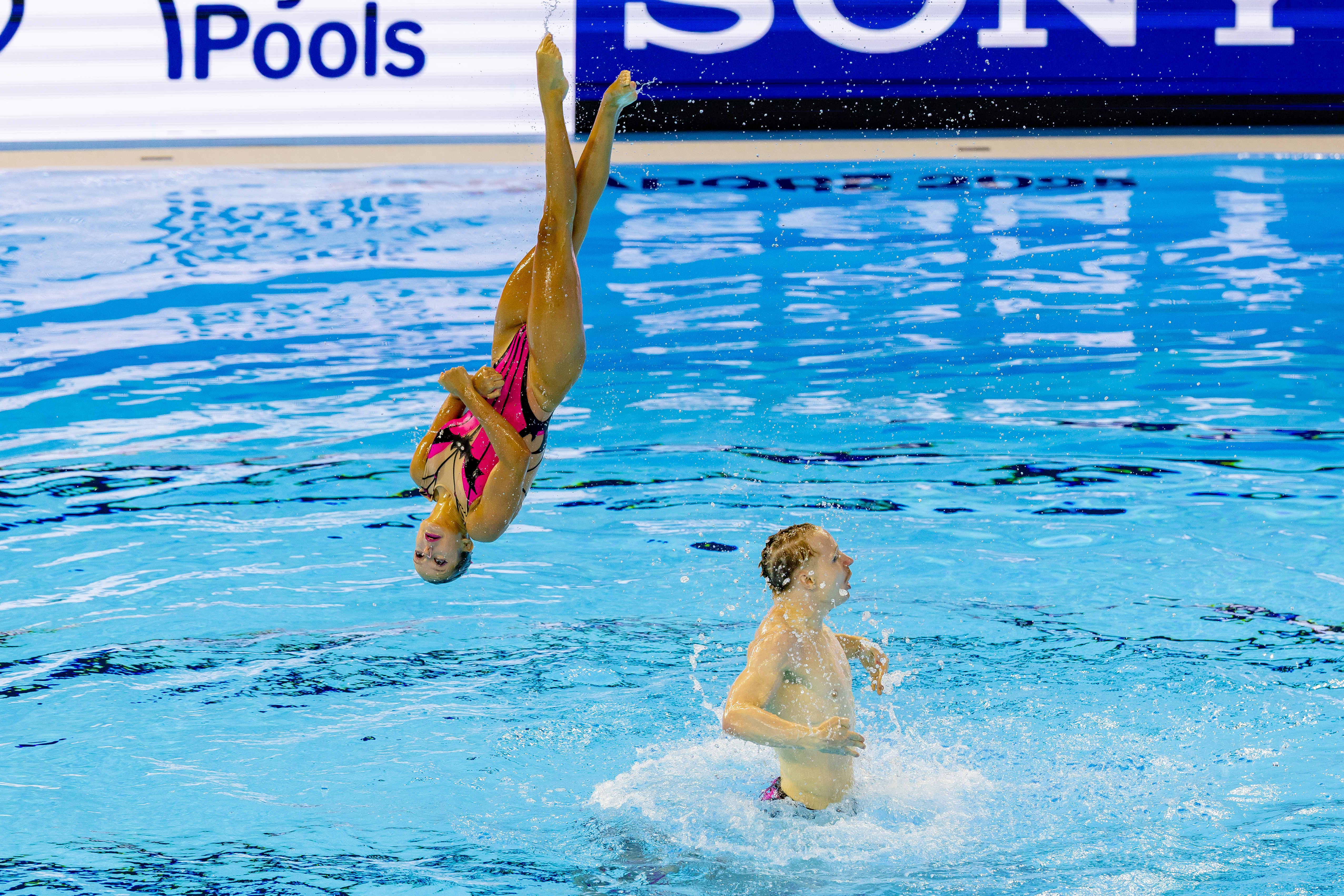 German artistic swimmer thrown through the air during competition in Singapore