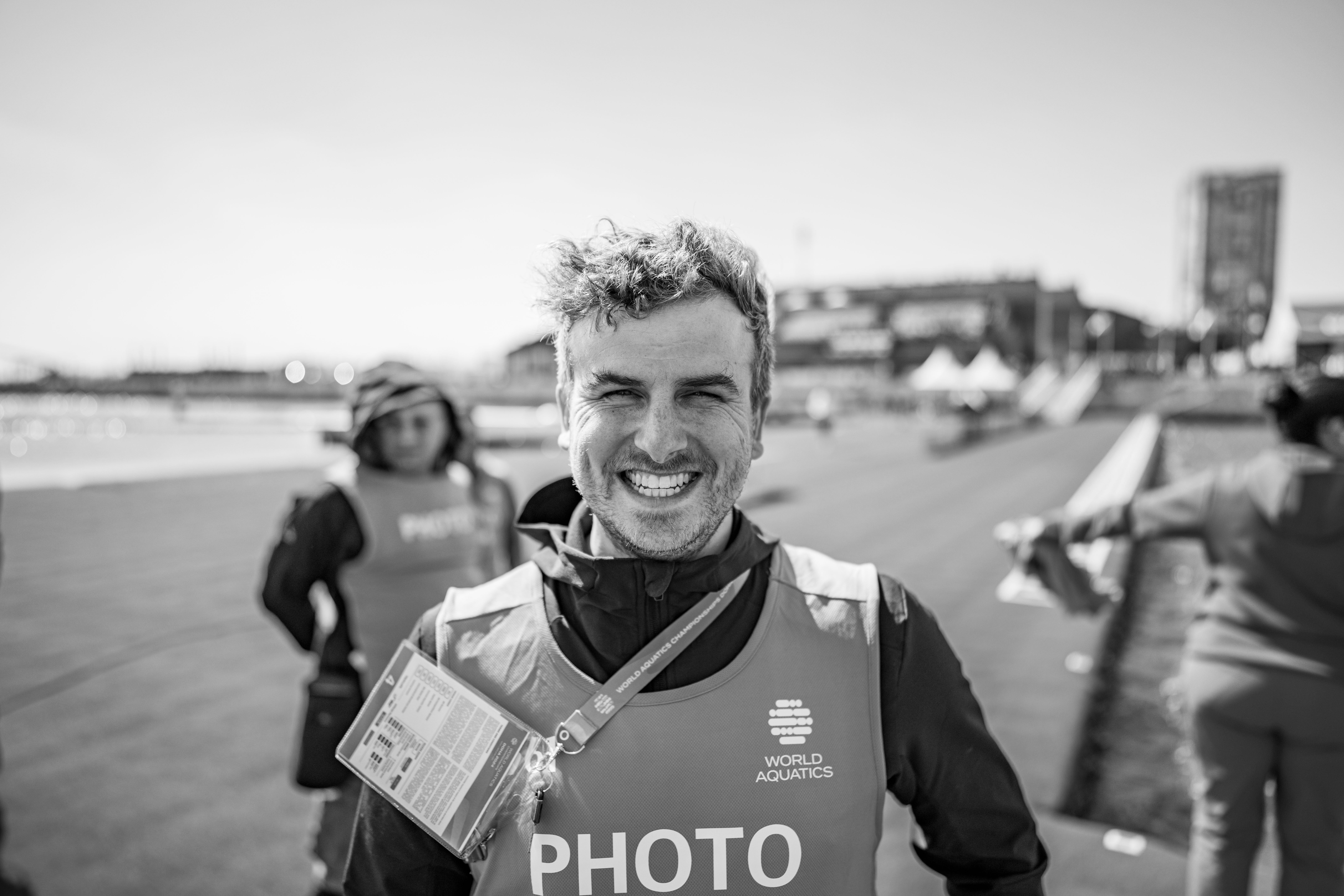 Jo Kleindl working as a photographer at an international event