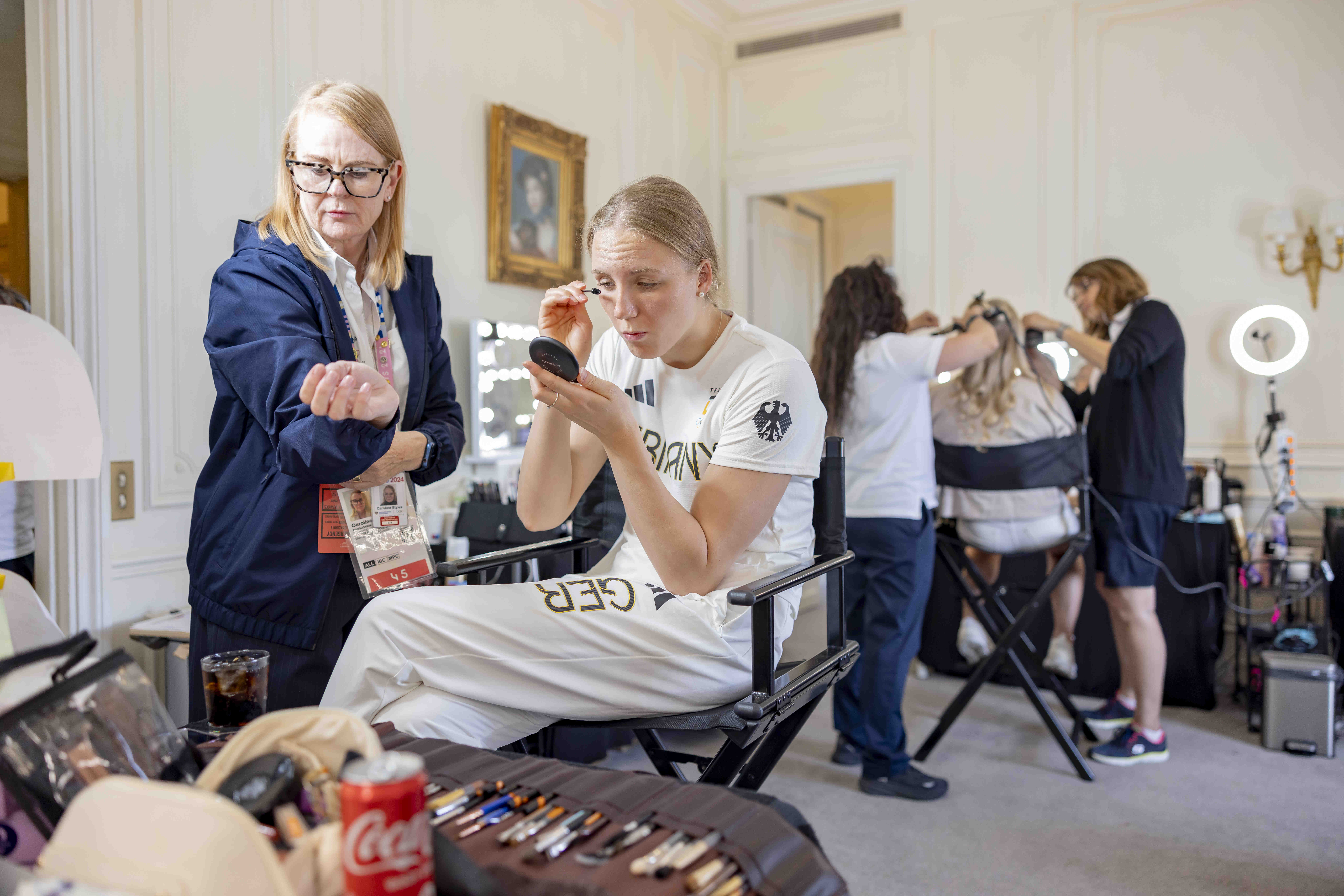 Isabel Gose preparing backstage before a media appearance