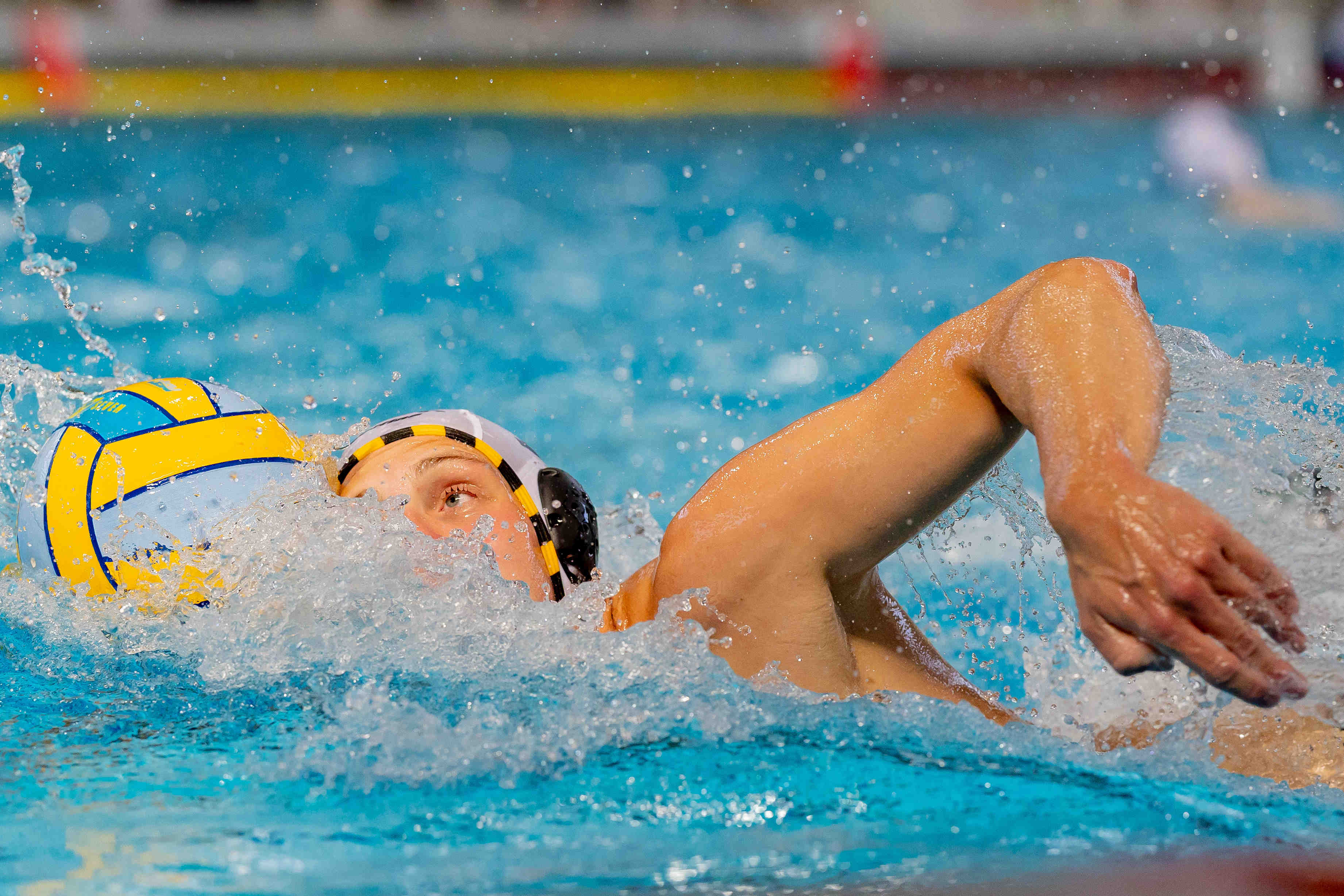 Water polo sprint with the ball