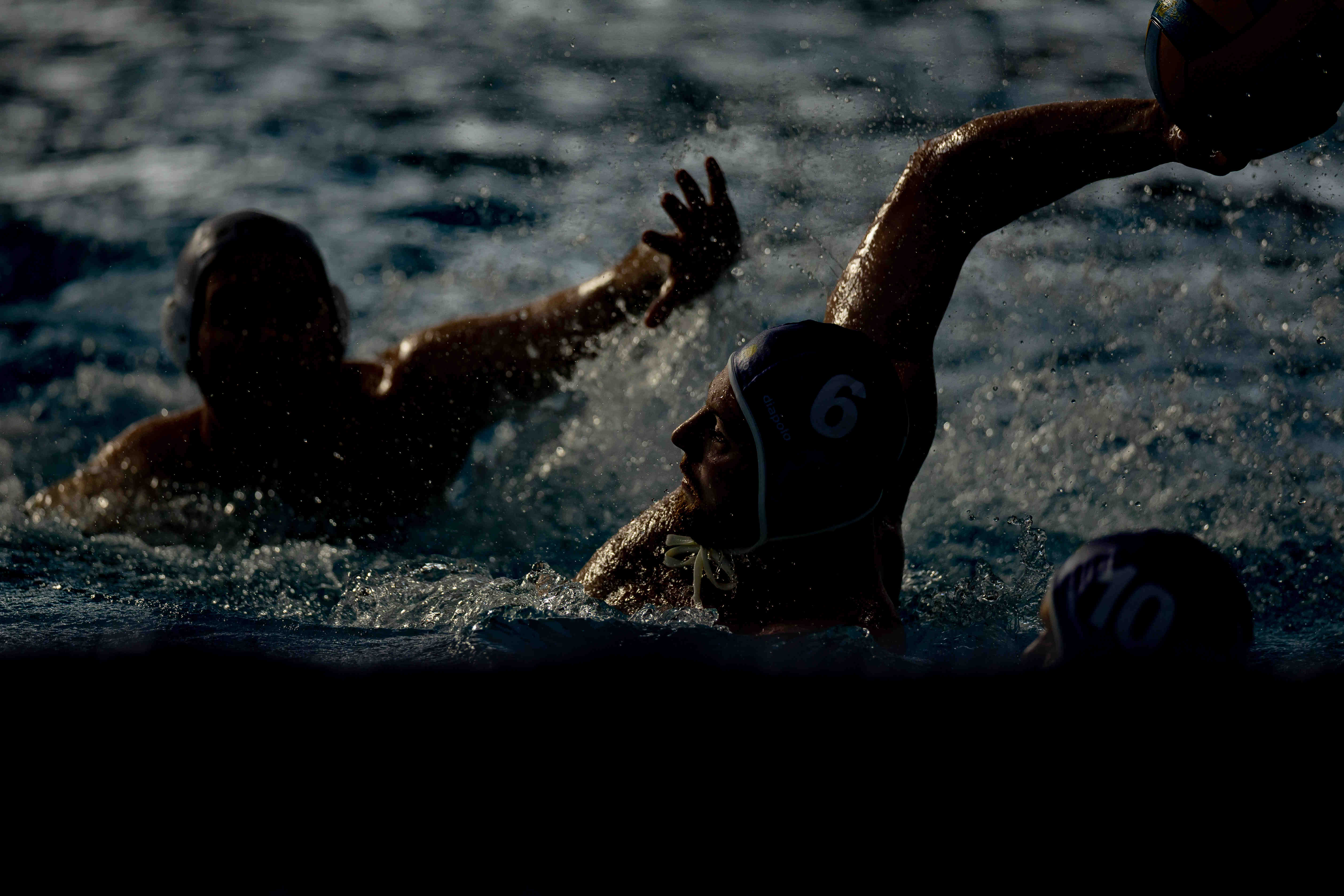 Water polo silhouette with ball
