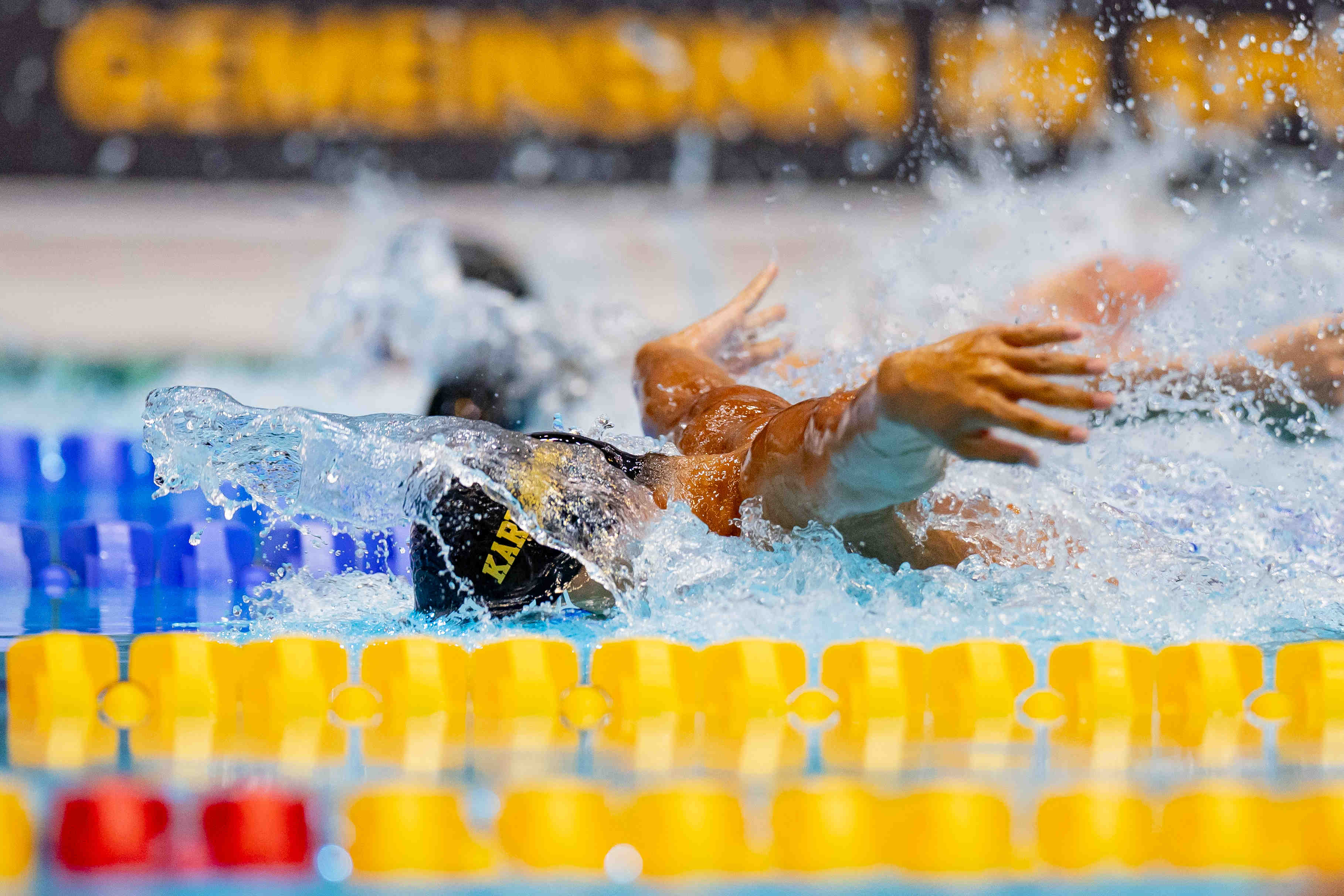 DJM athlete surfacing with wave