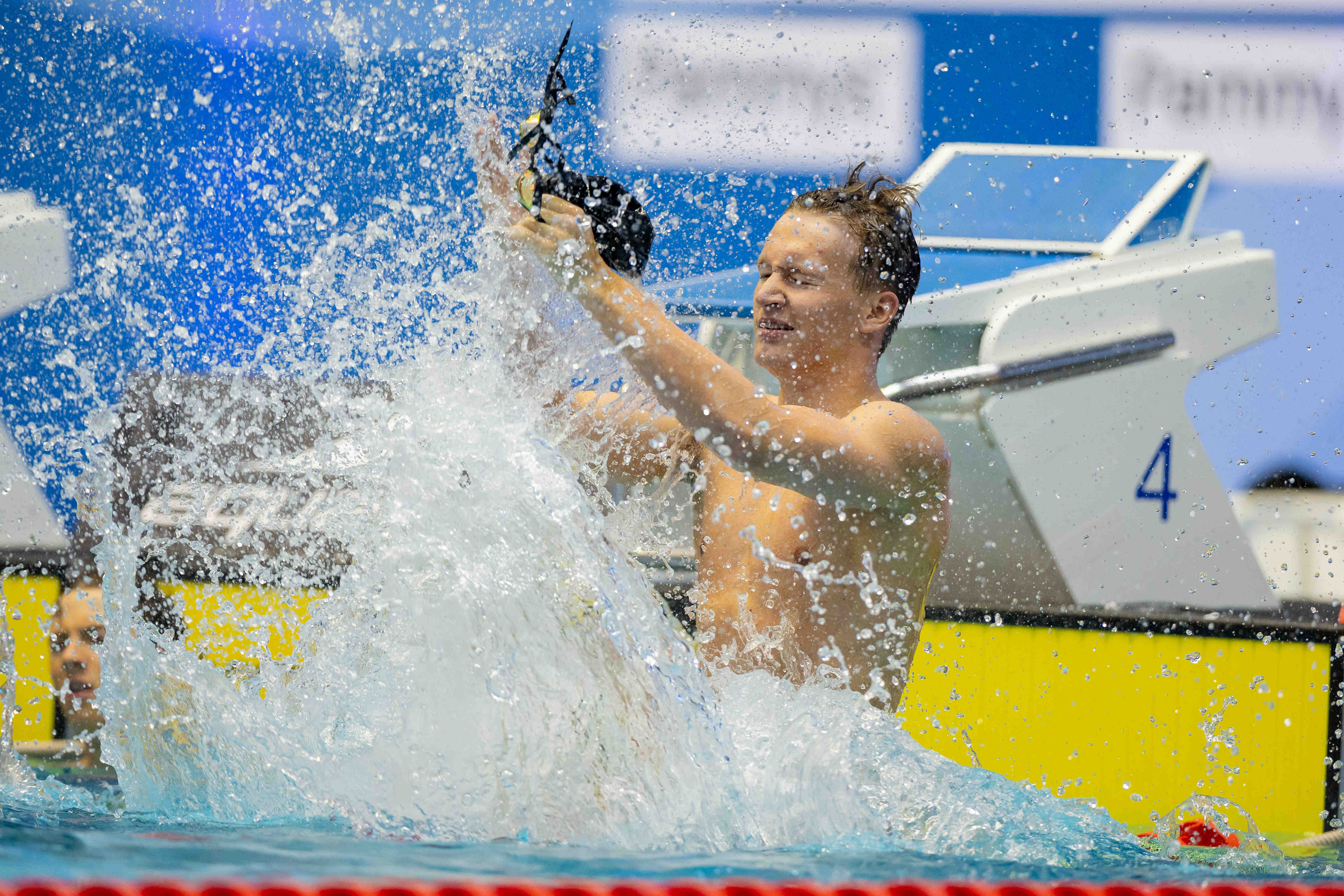 DJM athlete celebrating on the lane rope